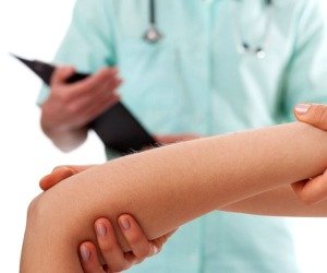 A Physical Therapy exam and Tennis Elbow injury treatment